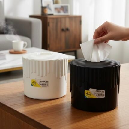 Aroni Household Decorative Round Plastic Tissue Box in black and white on a wooden table.