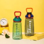 Stay hydrated in style with the all-new Energy Cup 750ml Water Bottle, designed for daily use whether you're at school, the gym, office, or on-the-go. Made with high-quality BPA-Free plastic, this lightweight bottle features a secure flip-lock cap that prevents leaks and spills – perfect for your backpack or gym bag. The sleek design and trendy colors make it a favorite among boys, girls, teens, and fitness lovers. Ideal for both hot and cold drinks, this durable bottle is easy to clean and comfortable to carry. A must-have for students, professionals, and athletes who want to drink water the smart way!