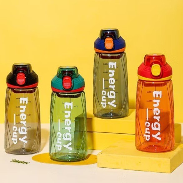 Stay hydrated in style with the all-new Energy Cup 750ml Water Bottle, designed for daily use whether you're at school, the gym, office, or on-the-go. Made with high-quality BPA-Free plastic, this lightweight bottle features a secure flip-lock cap that prevents leaks and spills – perfect for your backpack or gym bag. The sleek design and trendy colors make it a favorite among boys, girls, teens, and fitness lovers. Ideal for both hot and cold drinks, this durable bottle is easy to clean and comfortable to carry. A must-have for students, professionals, and athletes who want to drink water the smart way!