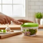 Best manual vegetable rope chopper Pakistan, durable plastic kitchen accessory for garlic and onion.