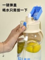 "Portable water bottle with handle and straw, 1700ml or 2000ml capacity, ideal for sports and travel"
