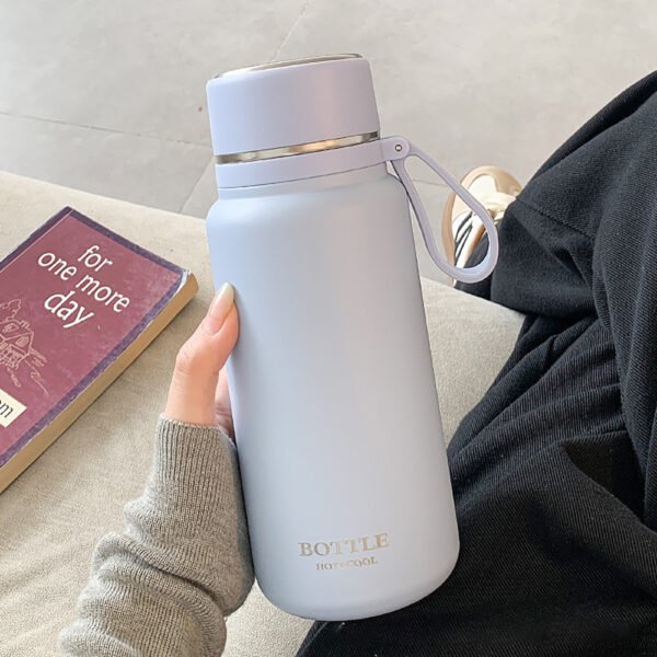 Light purple 800ml stainless steel thermos bottle with handle, ideal for hot and cold drinks