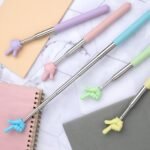 Man using a blue hand-shaped telescopic back scratcher stick for itching relief on his back
