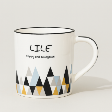 White ceramic coffee mug with colorful triangle design and “LILE – Happy and Annoyance” printed quote, featuring black rim and ergonomic handle – modern style drinkware