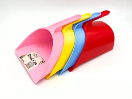 Stack of Aroni plastic dust pans in pink, yellow, blue, and red colors arranged on white background