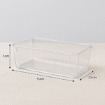 Clear plastic storage bin measuring 15x7.5x5cm shown with size indicators – part of a 4-pack multi-purpose organizer for drawers, kitchen, and office use