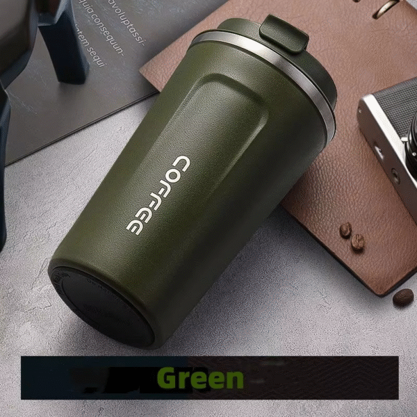 "Two stainless steel insulated coffee travel mugs in black and white with flip-top lids, held by hand in a modern café setting"