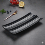 Black wavy rectangular ceramic serving platter displaying desserts on a wooden table – premium plate for snacks, appetizers, and hi-tea presentation.