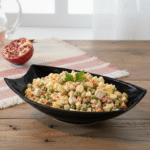 Black melamine soup bowl filled with hot ramen, boiled egg, meat, and vegetables, with chopsticks resting on top — durable, heat-resistant, and elegant serving bowl ideal for restaurants and homes