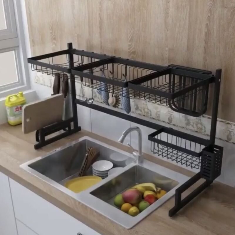 Black 1-layer kitchen sink rack, 33-inch long plate rack dish drainer for spacious sink organization in Pakistan.