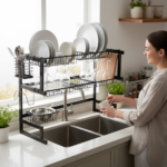 Black 2-layer kitchen sink rack and plate rack organizer, best sink dish drainer household item available in Pakistan.