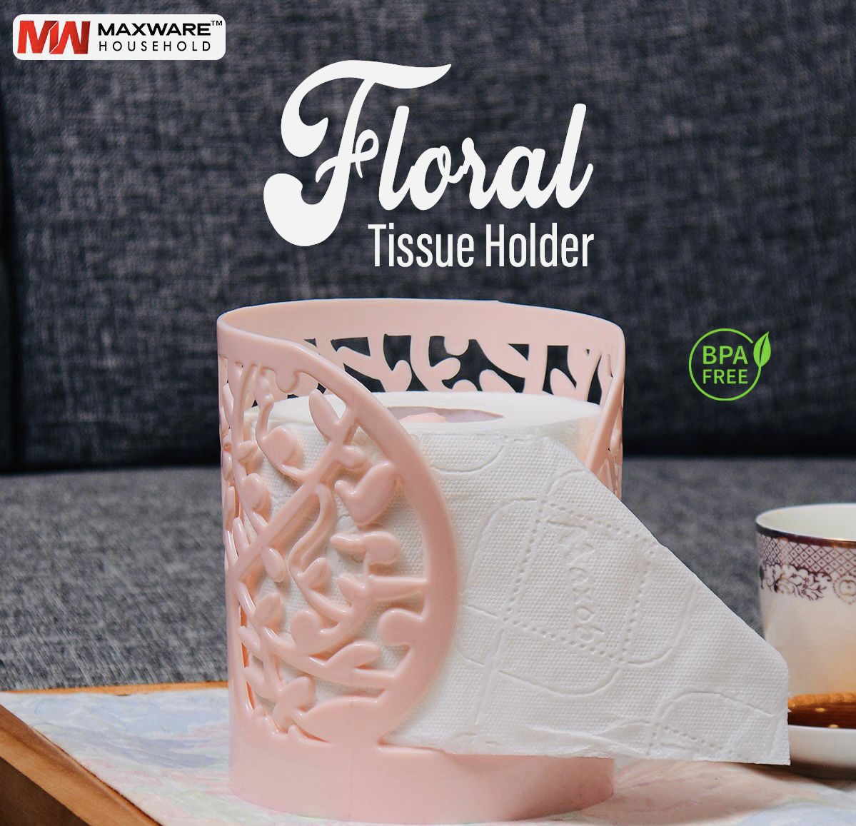 floral-tissue-roll-holder-maxware-pakistan.jpg Maxware Household floral tissue holders in white, pink, orange and grey holding tissue rolls on a table