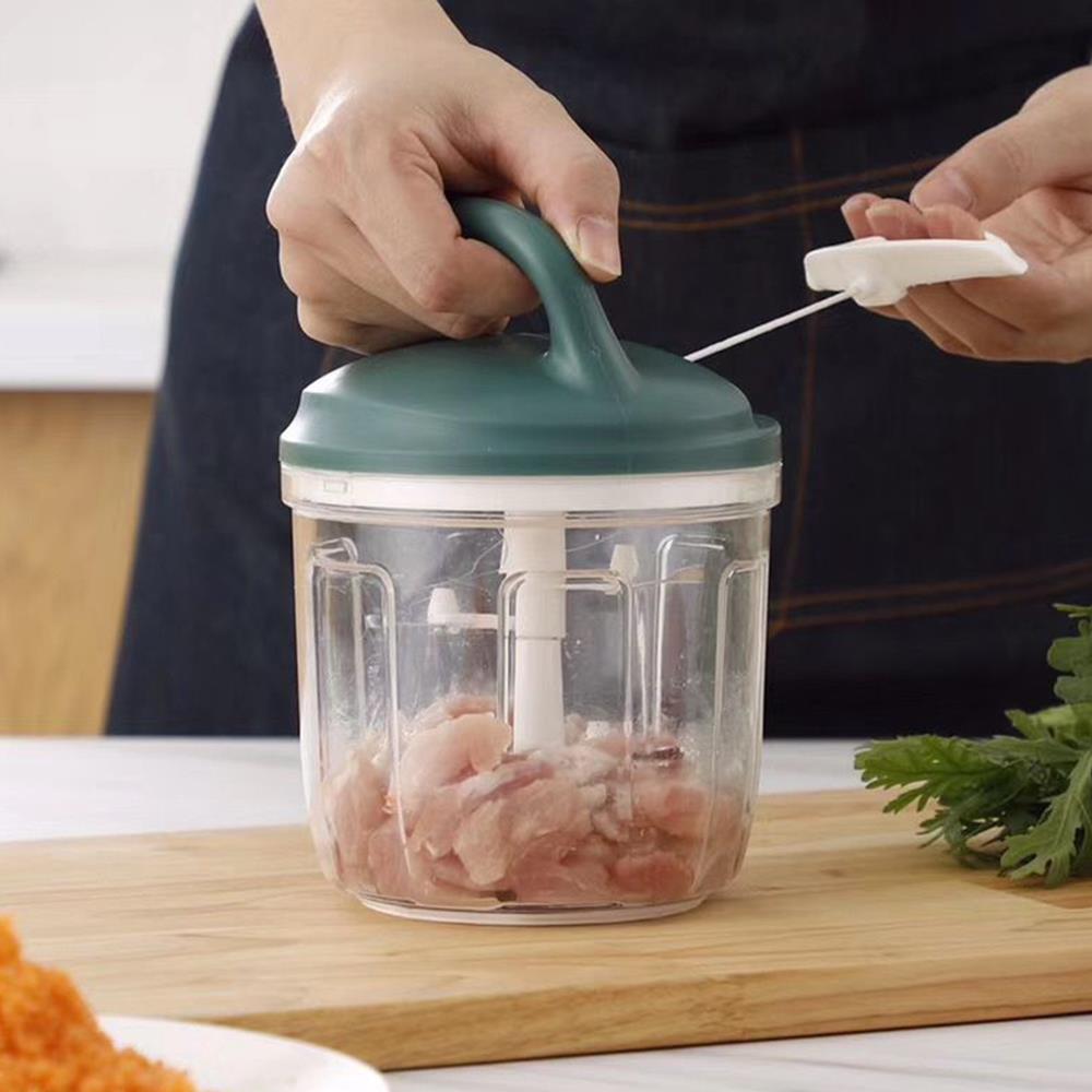 hand-chopper-machine-meat-vegetable-cutter-pakistan.jpg Manual hand chopper machine with green lid, transparent bowl and pull string for chopping meat and vegetables